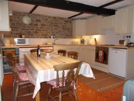 Well equipped kitchen with extending table to seat 10 guests
